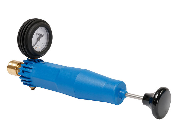 Cooling system tester with quick coupling and drain valve
